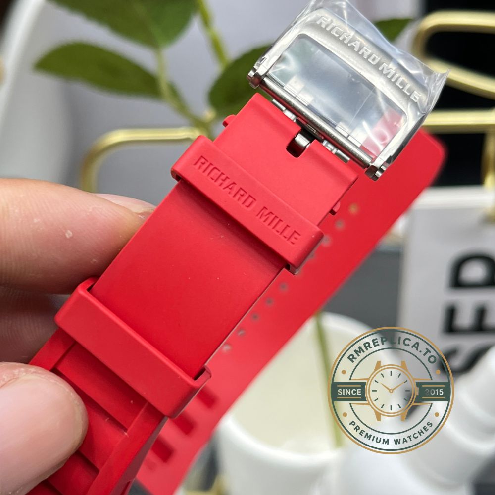 Replica Richard Mille watch RM35-02 crown detail side in-hand texture close-up – replica richard mille watch