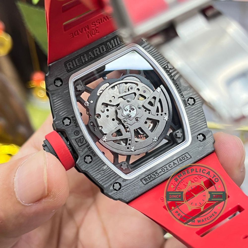 Richard Mille swiss replicas RM35-02 red rubber strap stainless steel buckle detail close-up – richard mille swiss replicas