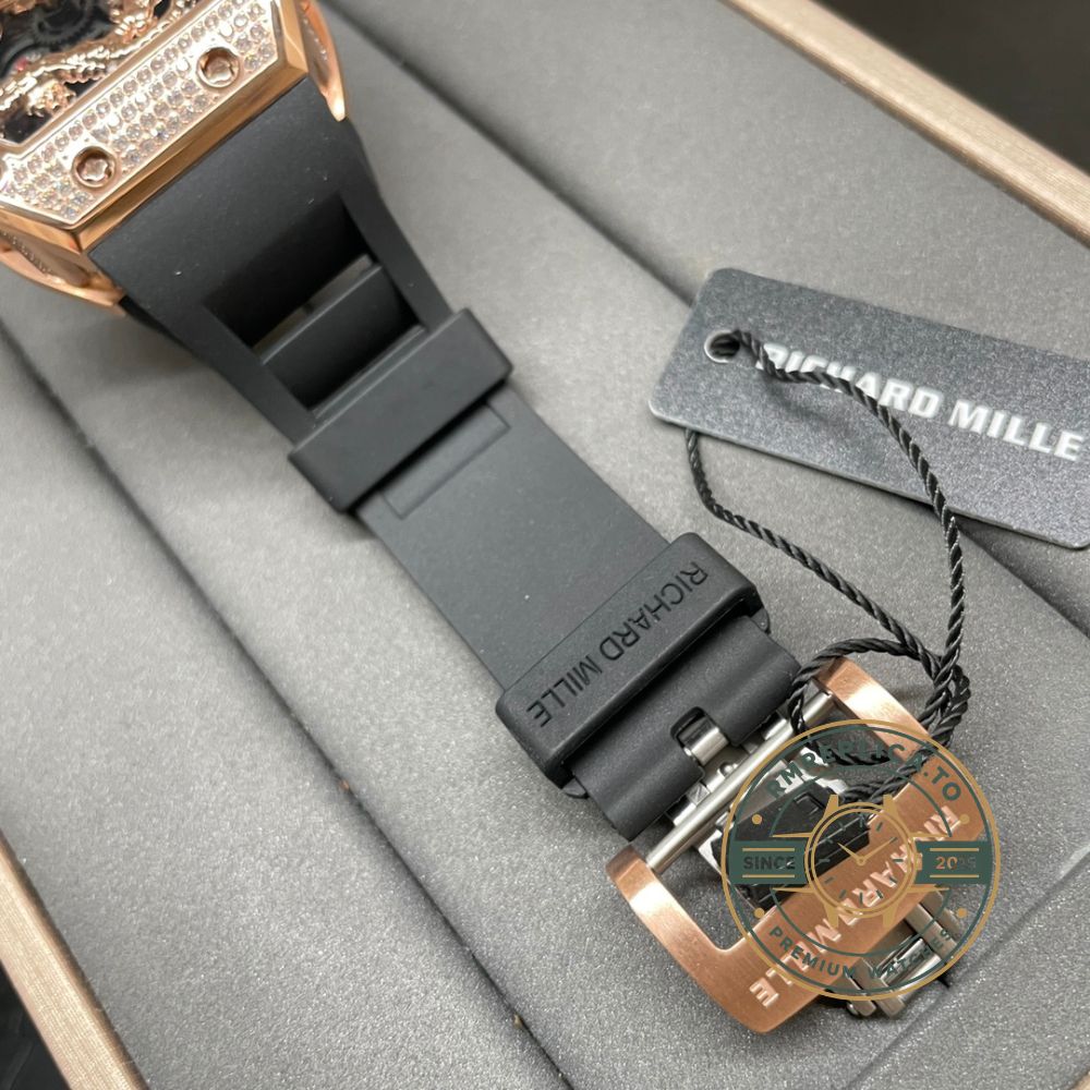 Richard Mille replica for sale RM 51-01 Tiger and Dragon on wrist with diamond bezel and black rubber strap – richard mille replica for sale