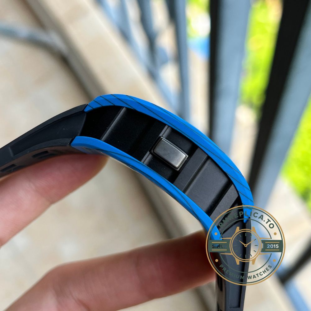 Fake Richard Mille RM022 skeleton dial detail with luminous hands and blue carbon case – fake richard mille