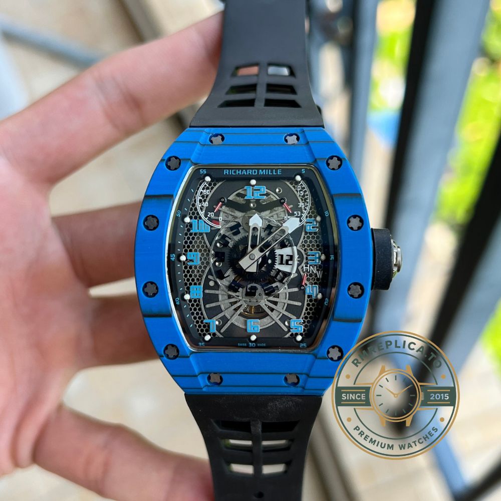 Richard Mille replica for sale RM022 on wrist with blue carbon case and skeleton dial – richard mille replica for sale