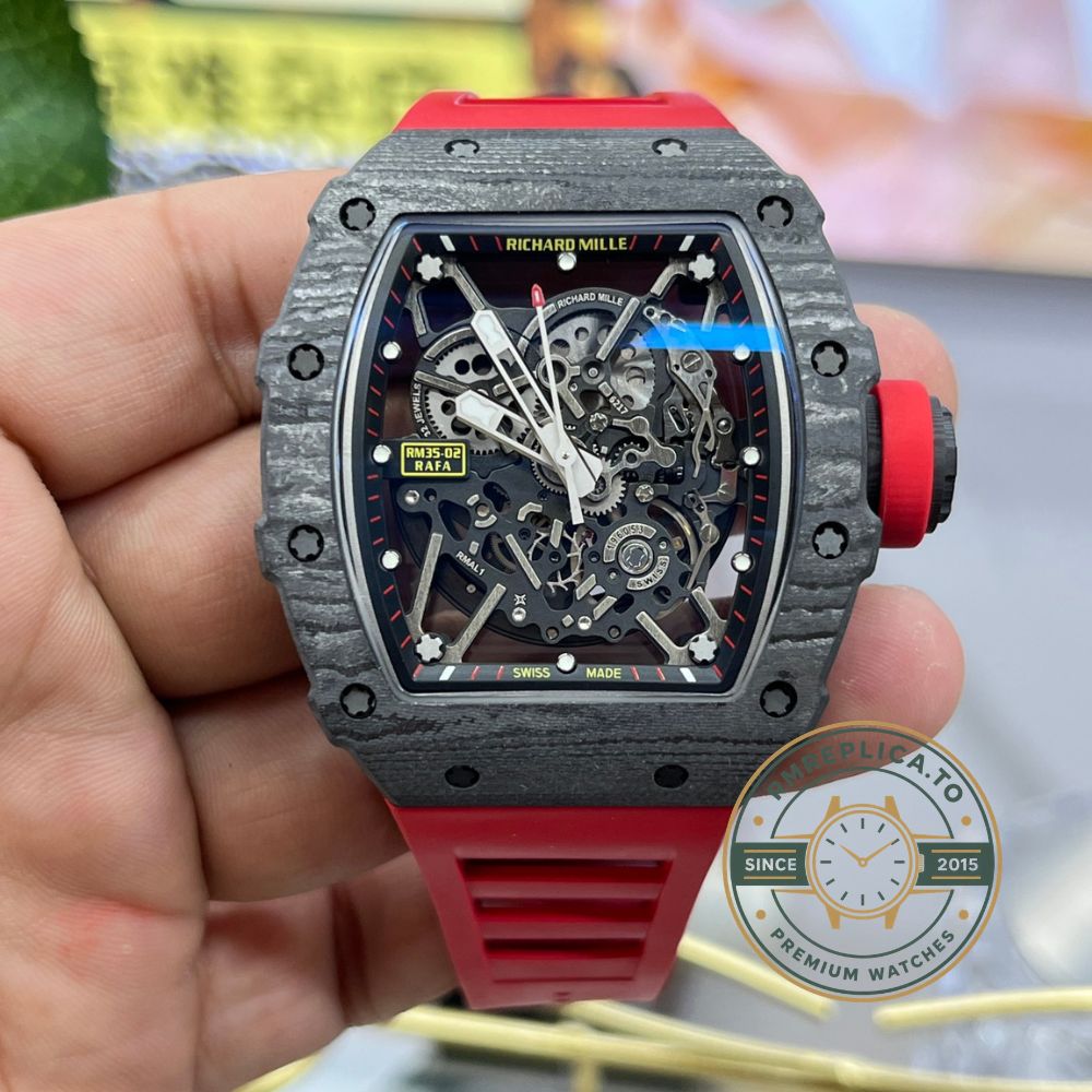 Richard Mille RM35-02 Rafa carbon fiber case black skeleton dial red rubber strap angled front detail view handheld display – imitation richard mille
