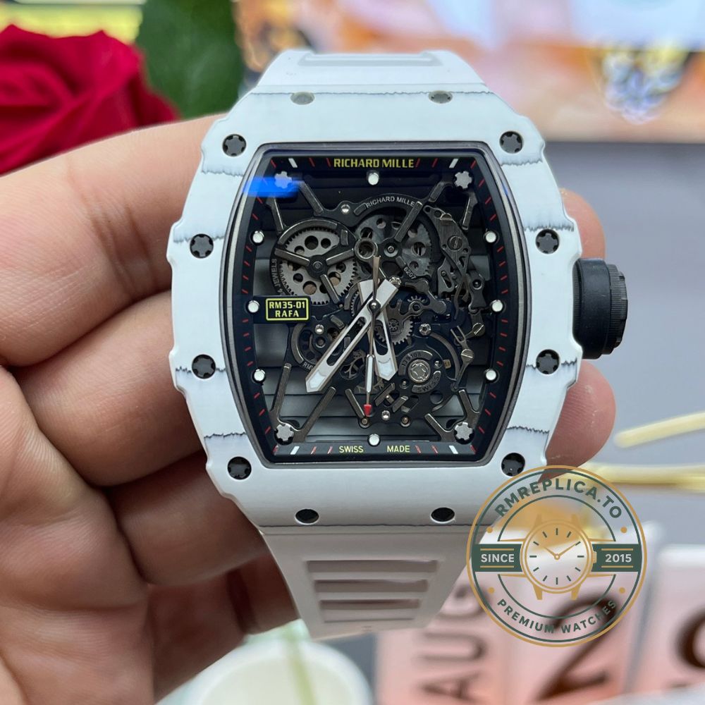 Replica Richard Mille watch RM35-01 white carbon case black skeleton dial white rubber strap close-up detail view – replica richard mille watch