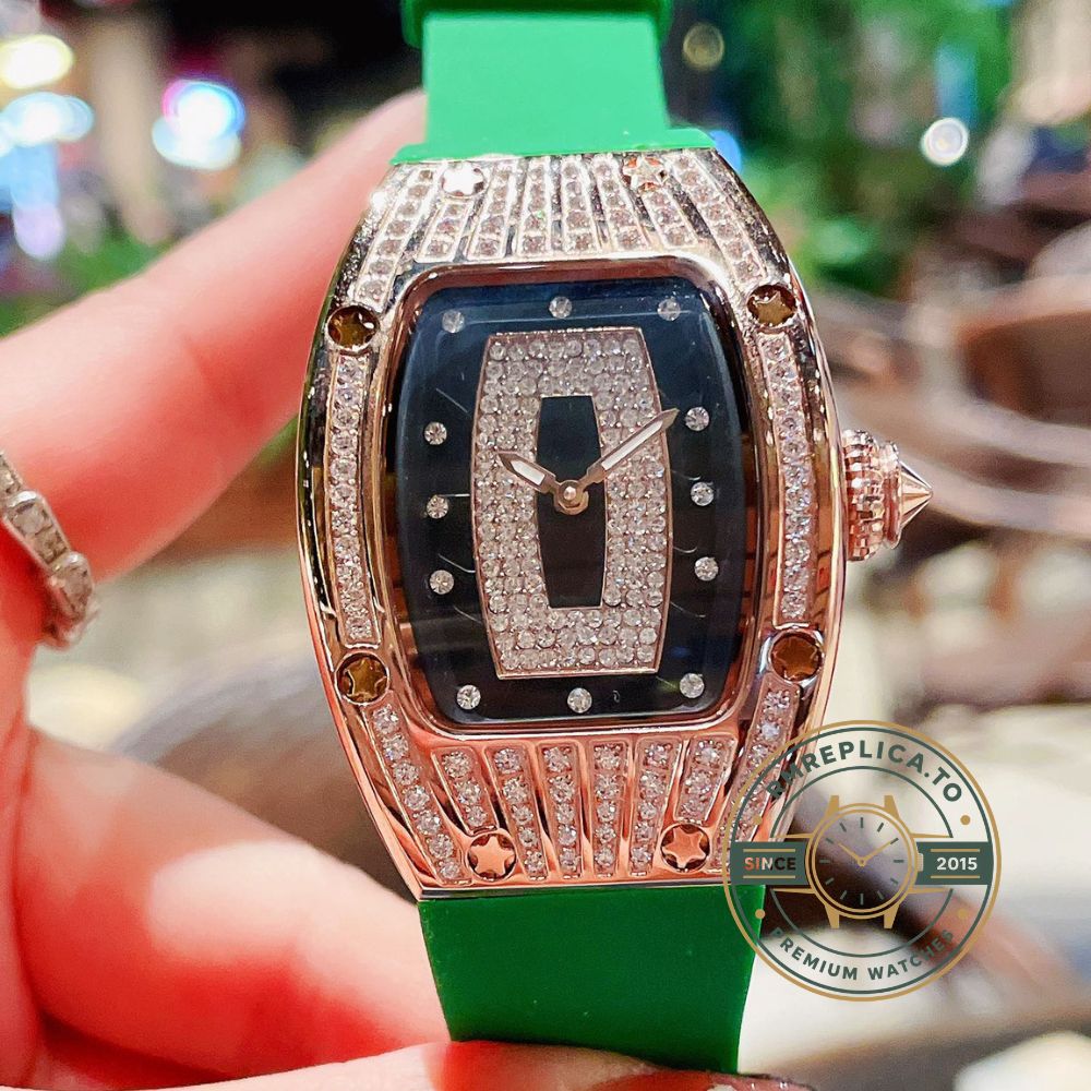 Replica Richard Mille watch RM 007 angled view showing gold-plated stainless steel case and green rubber strap – replica richard mille watch