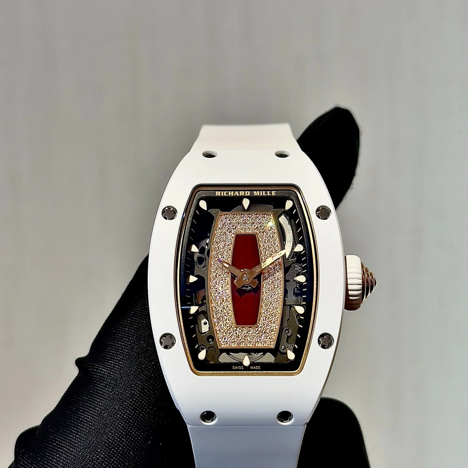Side profile showing the lightweight white ceramic case of this richard mille super clone timepiece.
