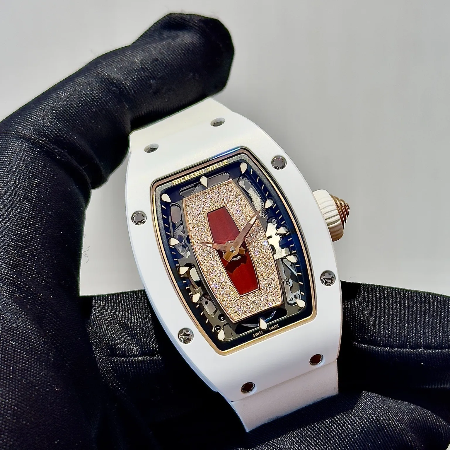 Transparent caseback revealing the smooth automatic movement inside this high quality richard mille replica.