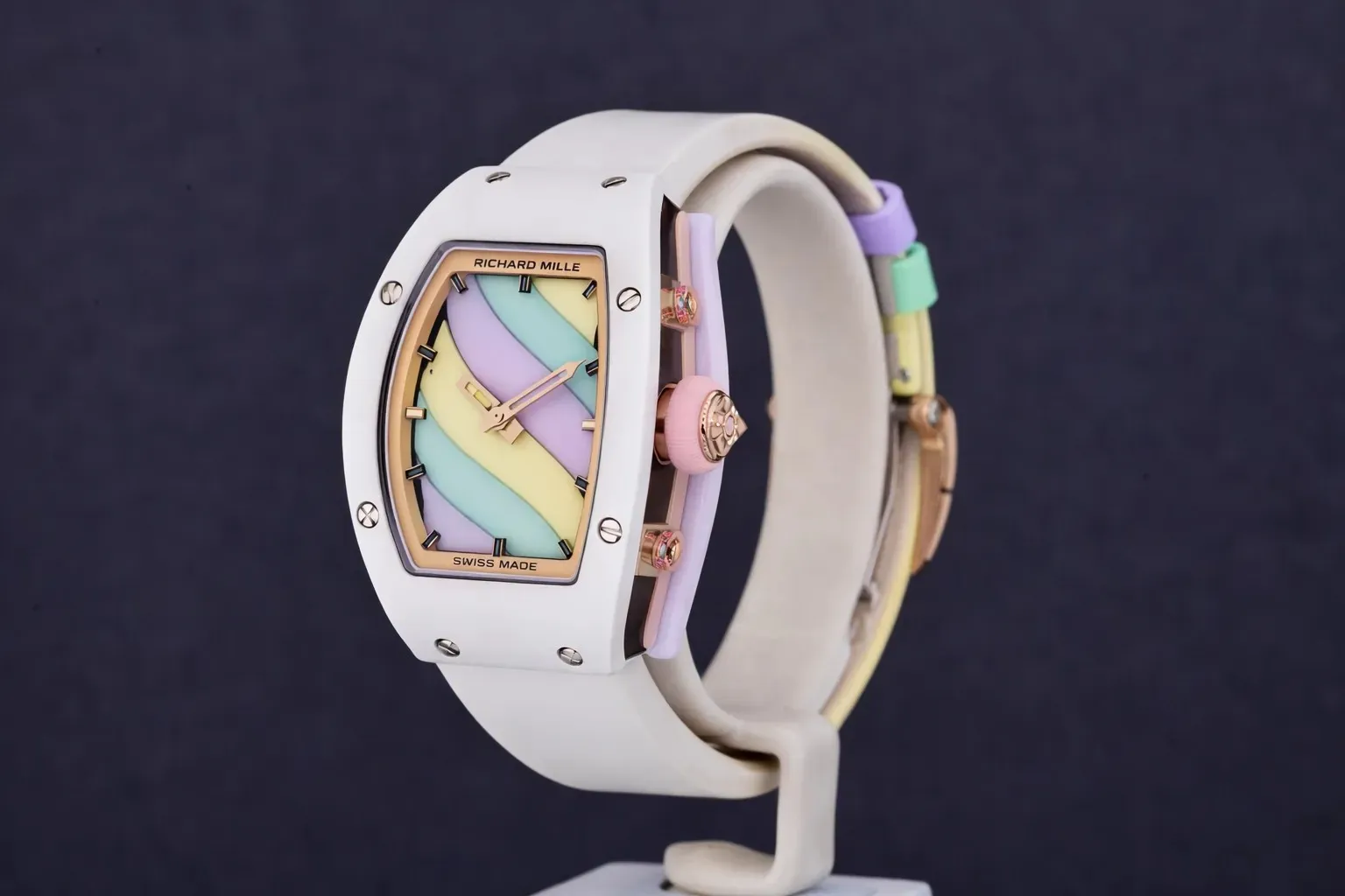 Macro detail of the refined titanium pin buckle and white ceramic clasp on this Richard Mille knockoff.